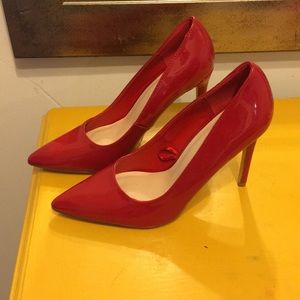 Red Patten leather pumps